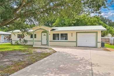 Welcome home to this well-maintained 3-bedroom, 2-bath CBS home - photo 1
