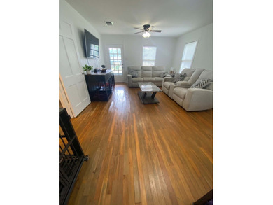 Charming 2 bedroom, 1 bath home featuring original hardwood - photo 3