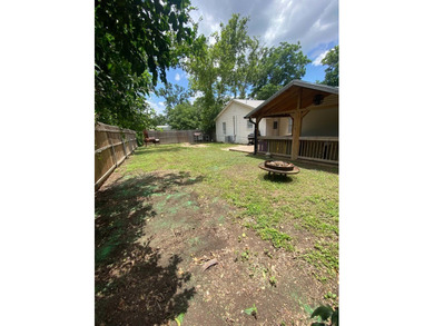 Charming 2 bedroom, 1 bath home featuring original hardwood - photo 9