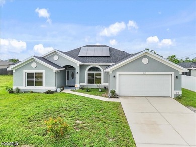 Welcome to this beautifully maintained 4-bedroom, 2-bathroom - photo 1