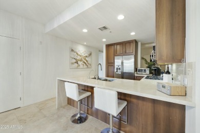 Luxury living at Optima Camelview Village! This 6th-floor, 2 bed