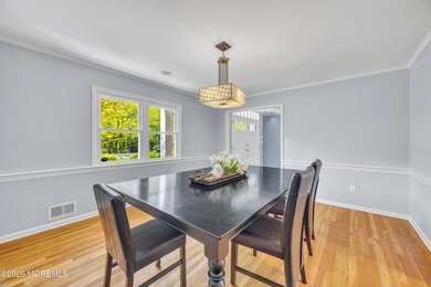 Stately center hall colonial set on an oversized 1.3-acre lot in - photo 11