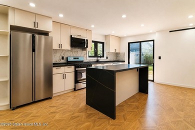 Beautifully renovated single-family Detached home in the - photo 11