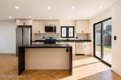 Beautifully renovated single-family Detached home in the - photo 13