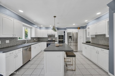 Stately center hall colonial set on an oversized 1.3-acre lot in - photo 14