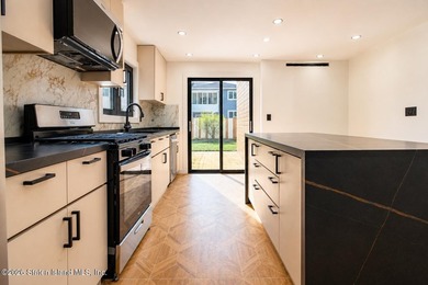 Beautifully renovated single-family Detached home in the - photo 14