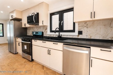 Beautifully renovated single-family Detached home in the - photo 15