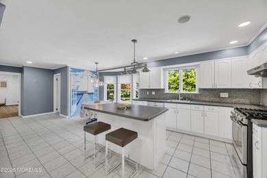 Stately center hall colonial set on an oversized 1.3-acre lot in - photo 16