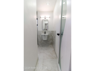 Beautifully renovated single-family Detached home in the - photo 18