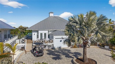 Water Wings cottage is waterfront, two-stories with Master on - photo 4