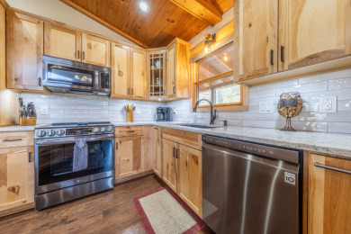Beautiful updates, Waterfront home with a garage and end dock! - photo 7
