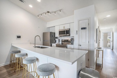 This top-floor remodeled, 1-bedroom, 1-bath condo offers a - photo 6