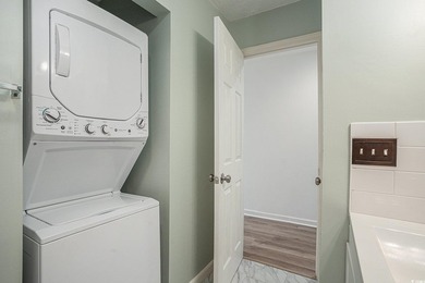 This top-floor remodeled, 1-bedroom, 1-bath condo offers a - photo 10