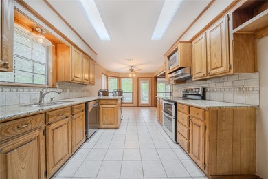 Turn-key lake house with a huge 1.25 Acre lot! Take a look at - photo 16