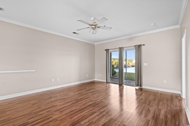 Welcome to this charming 2-bedroom, 2-bathroom first-floor condo