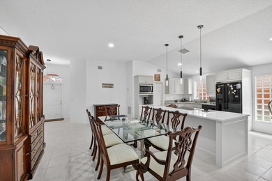 WOW - Awesome pool home with renovated kitchen, flooring and - photo 8