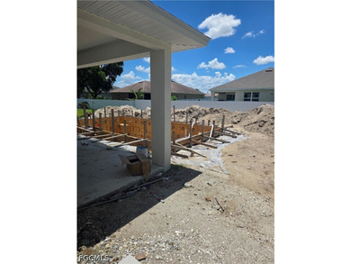 This 4 bedroom 2 bathroom centrally located home with a pool and - photo 3