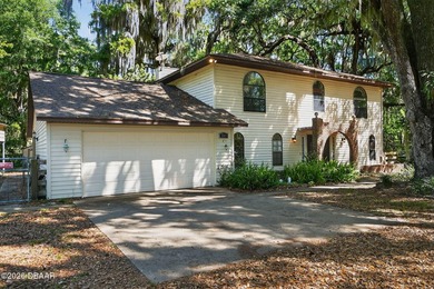 The expansive 2,574 sq. ft. interior features a formal living - photo 1