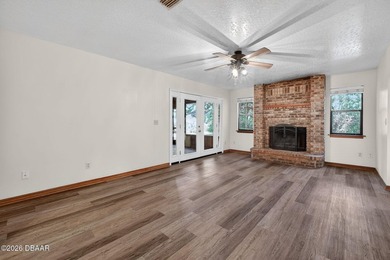 The expansive 2,574 sq. ft. interior features a formal living - photo 4