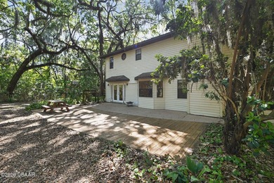 The expansive 2,574 sq. ft. interior features a formal living - photo 7