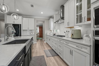 Welcome home to this beautifully upgraded 4-bedroom, 3-bath - photo 23