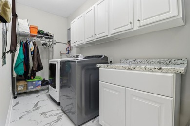 Enjoy deep-water lakefront living in this well-maintained - photo 31