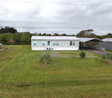 Lake Home For Sale in Moore Haven, Florida