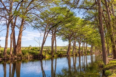 Set on a 1.93-acre tract in Canyon Springs Ranch with - photo 2