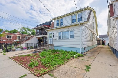 Welcome to this beautifully renovated detached 2-family home in - photo 1