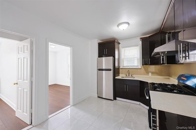 Welcome to this beautifully renovated detached 2-family home in - photo 6