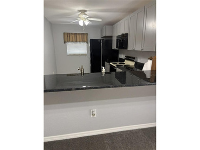 HIGHLY SOUGHT AFTER FIRST FLOOR CORNER UNIT.LOCATION IS ALWAYS - photo 3