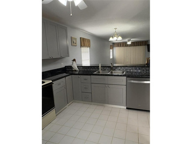 HIGHLY SOUGHT AFTER FIRST FLOOR CORNER UNIT.LOCATION IS ALWAYS - photo 4