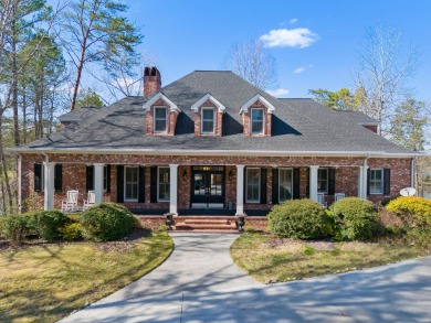 Smith Lake (Stoney Point) A custom full brick home on a lovely - Lake Home For Sale in Double Springs, Alabama