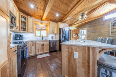 Beautiful updates, Waterfront home with a garage and end dock! - photo 8