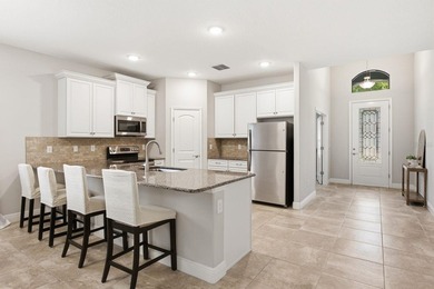 Featuring 3 bedrooms plus a dedicated den, this open-concept - photo 2