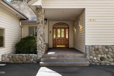 Custom single-level home overlooking the 8th fairway in the - photo 2