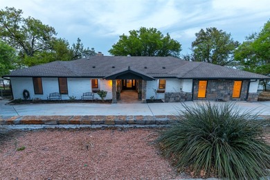 Welcome to 440 Lakeside Drive, a premier lakefront property on - photo 3