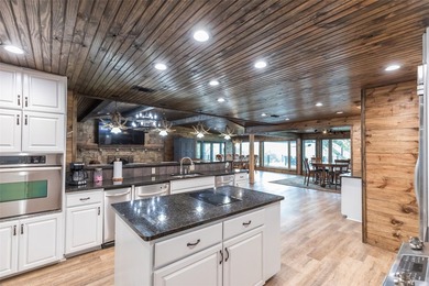 Welcome to 440 Lakeside Drive, a premier lakefront property on - photo 4