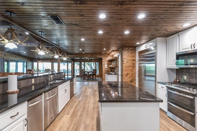Welcome to 440 Lakeside Drive, a premier lakefront property on - photo 5
