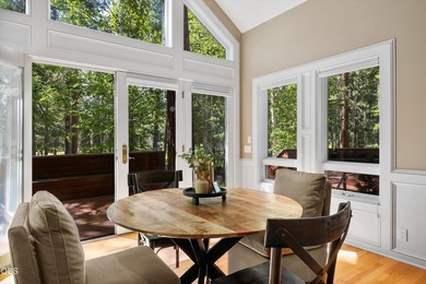 Custom single-level home overlooking the 8th fairway in the - photo 5