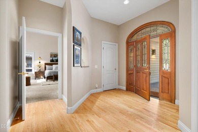 Custom single-level home overlooking the 8th fairway in the - photo 7