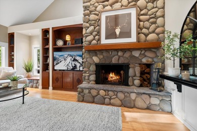 Custom single-level home overlooking the 8th fairway in the - photo 9