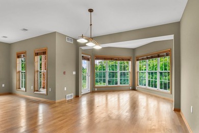 Enjoy peaceful living & abundant natural light in this - photo 2