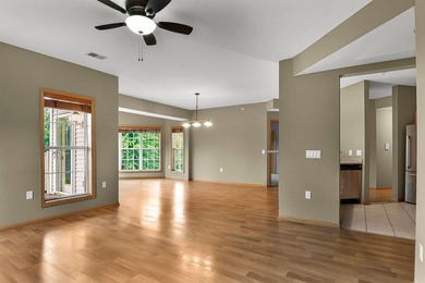 Enjoy peaceful living & abundant natural light in this - photo 8