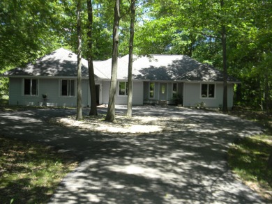 Little Muskegon River Home Sale Pending in Canadian Lakes Michigan
