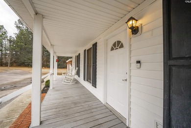 Welcome home to 4652 Two Notch Road in Gilbert! This beautifully