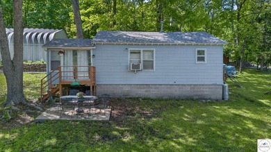 Tucked away in a quiet lakeside subdivision, this charming - photo 38
