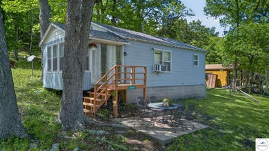 Tucked away in a quiet lakeside subdivision, this charming - photo 40