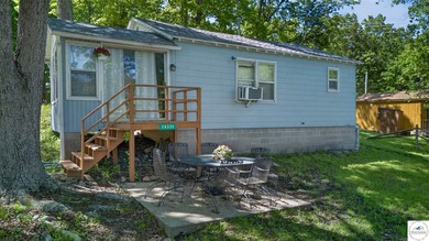 Tucked away in a quiet lakeside subdivision, this charming - photo 41