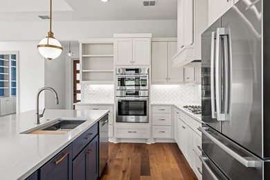 Experience luxury Hill Country living in this stunning rock & - photo 3